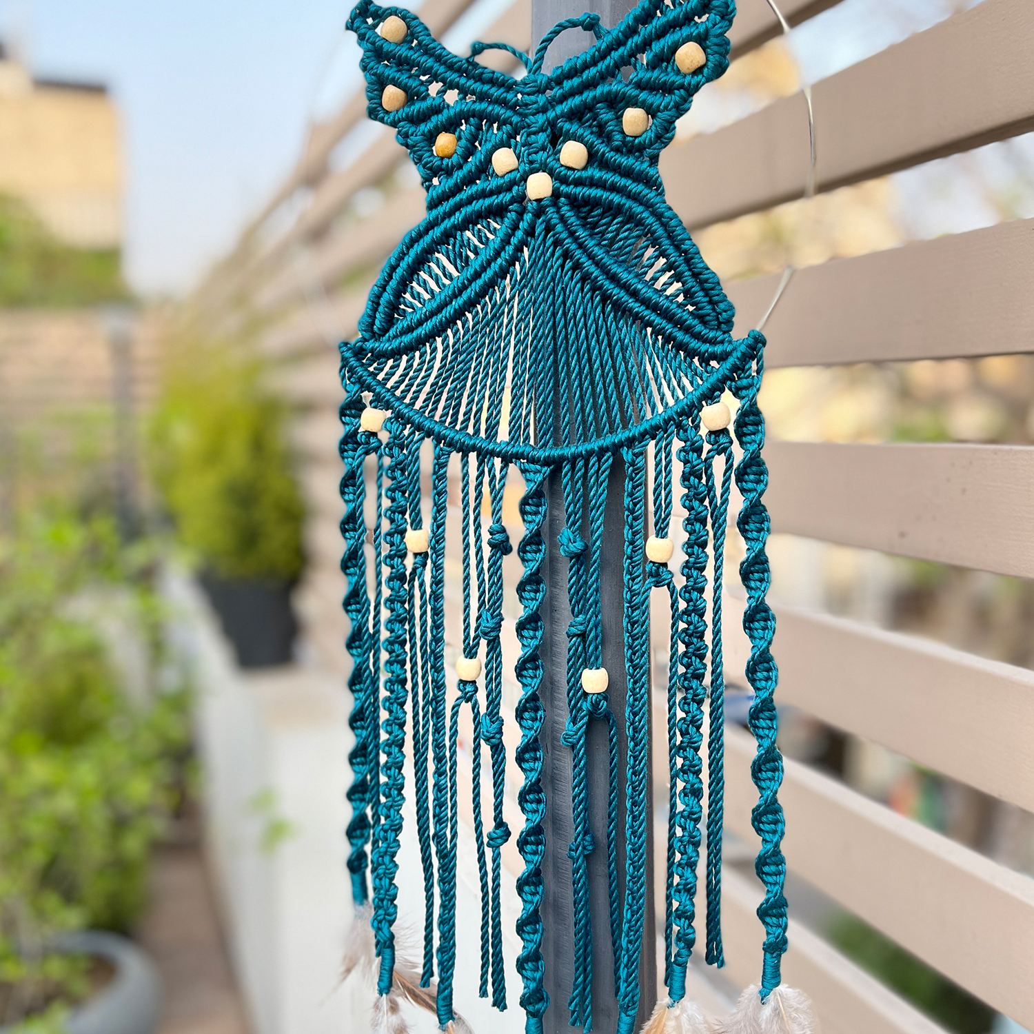 Teal Blue Macrame Wall Hanging With Feathers on Edge